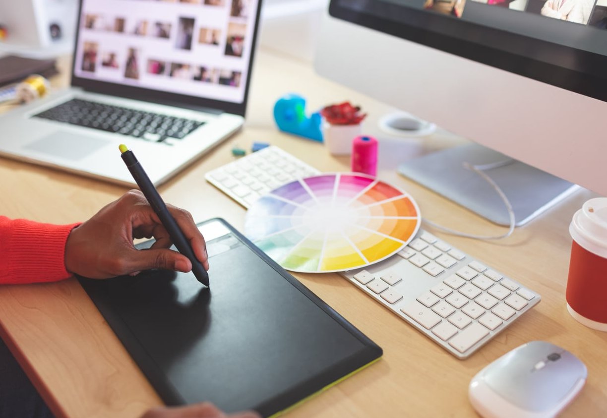 laptop graphic design workspace