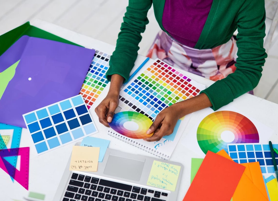 laptop graphic design workspace